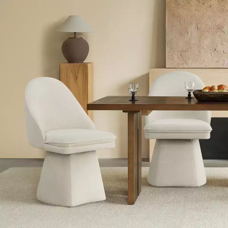 Chaise de salle à manger pivotante Spruce&Spring avec dossier haut incurvé et base conique