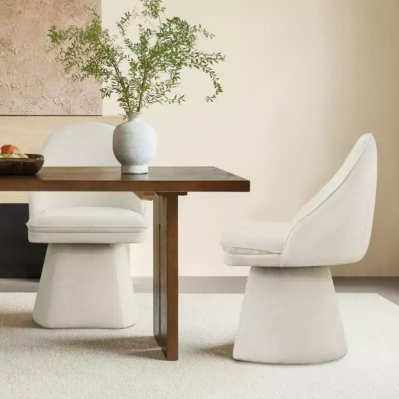 Chaise de salle à manger pivotante Spruce&Spring avec dossier haut incurvé et base conique