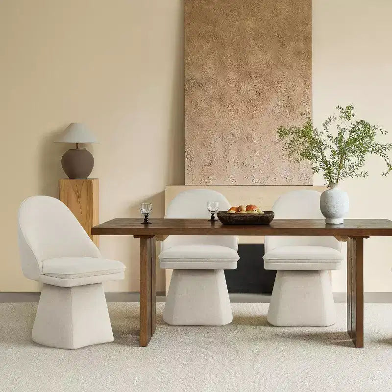 Chaise de salle à manger pivotante Spruce&Spring avec dossier haut incurvé et base conique