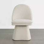 Chaise de salle à manger pivotante Spruce&Spring avec dossier haut incurvé et base conique