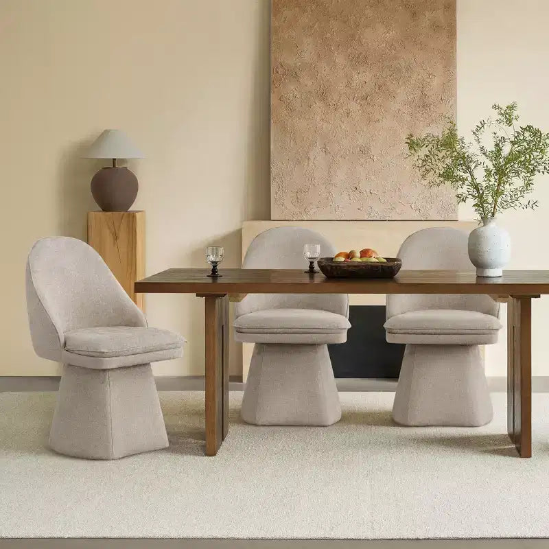 Chaise de salle à manger pivotante Spruce&Spring avec dossier haut incurvé et base conique