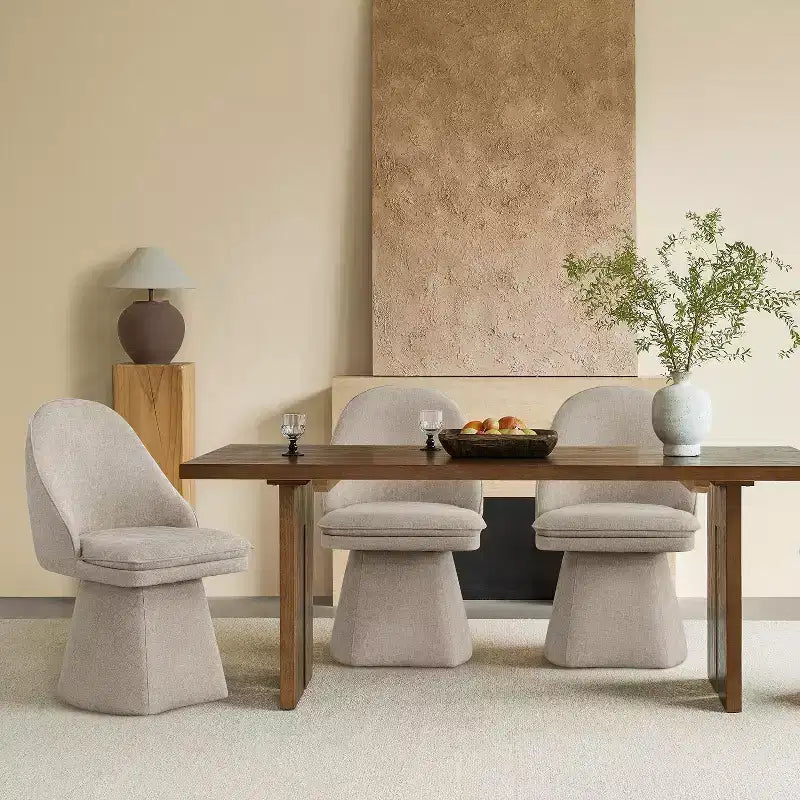 Chaise de salle à manger pivotante Spruce&Spring avec dossier haut incurvé et base conique