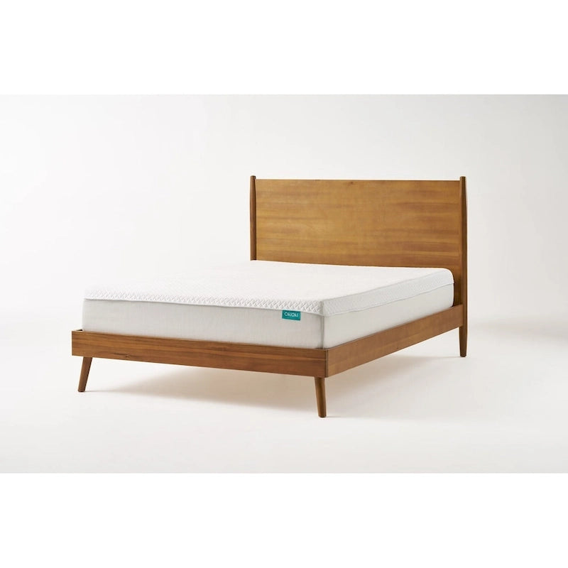 Lit plateforme de style moderne en bois d'acacia naturel, format King Size, avec pieds emblématiques évasés pour chambre à coucher