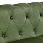 Canapé 3 places Chesterfield en velours vert, capitonnage et accoudoirs volutes