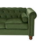 Canapé 3 places Chesterfield en velours vert, capitonnage et accoudoirs volutes