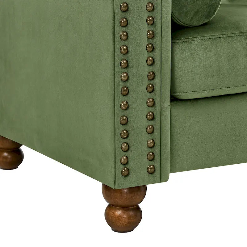 Canapé 3 places Chesterfield en velours vert, capitonnage et accoudoirs volutes