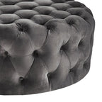 Pouf rond touffeté Gdansk avec roulettes