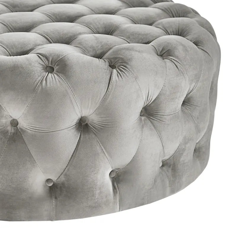 Pouf rond touffeté Gdansk avec roulettes