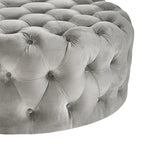 Pouf rond touffeté Gdansk avec roulettes