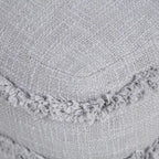 Pouf ottoman Sevita en tissu texturé rayé