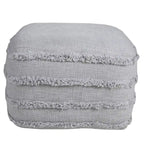 Pouf ottoman Sevita en tissu texturé rayé