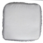 Pouf ottoman Sevita en tissu texturé rayé