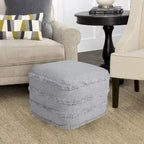 Pouf ottoman Sevita en tissu texturé rayé