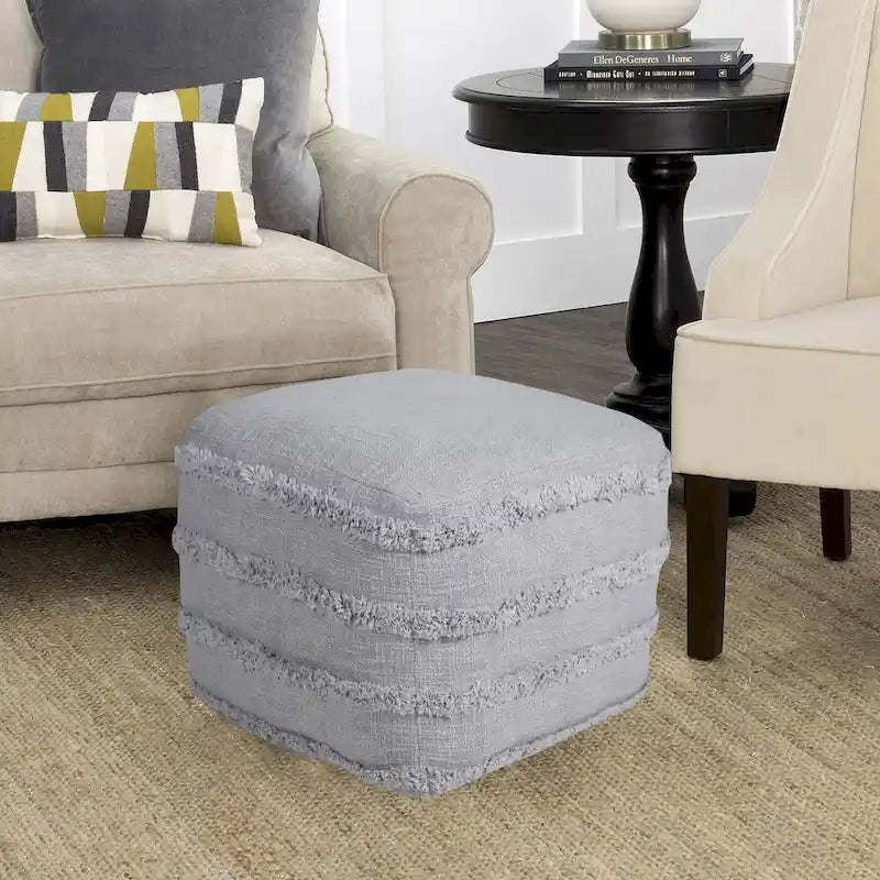 Pouf ottoman Sevita en tissu texturé rayé