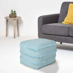 Pouf ottoman Sevita en tissu texturé rayé