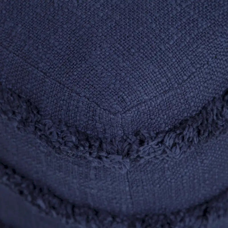 Pouf ottoman Sevita en tissu texturé rayé