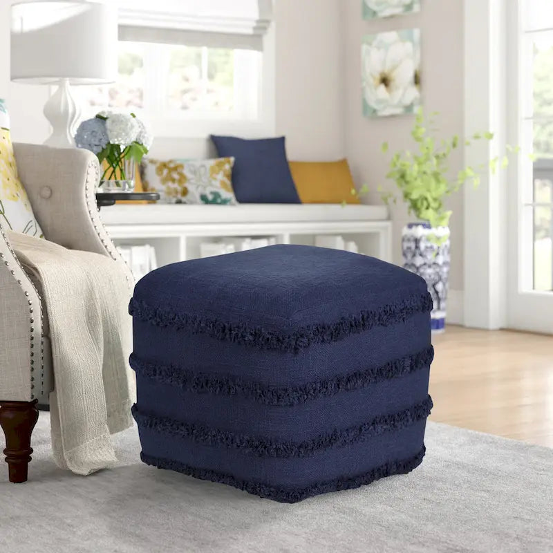 Pouf ottoman Sevita en tissu texturé rayé