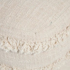 Pouf ottoman Sevita en tissu texturé rayé