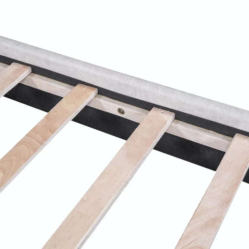 Lit plateforme rembourré avec deux grandes têtes de lit et un tissu épais