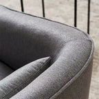 Fauteuil pivotant avec repose-pieds et piètement en métal noir