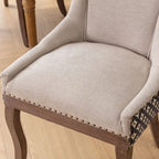 Chaise de salle à manger Ultra Side, Chaises en tissu épaissi avec pieds en bois massif aux tons neutres, Clous décoratifs couleur bronze, Lot de 2